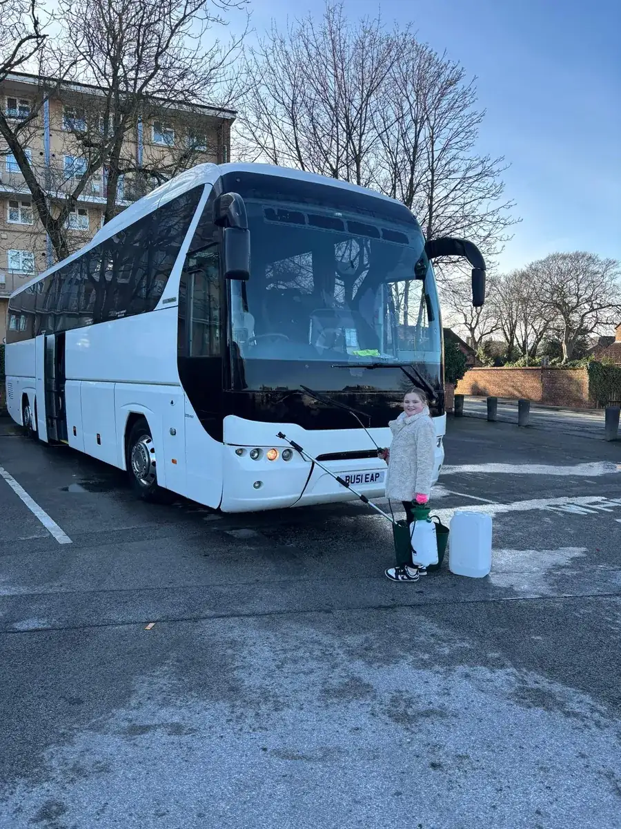 Helping to clean a Leap Travel Tourliner coach