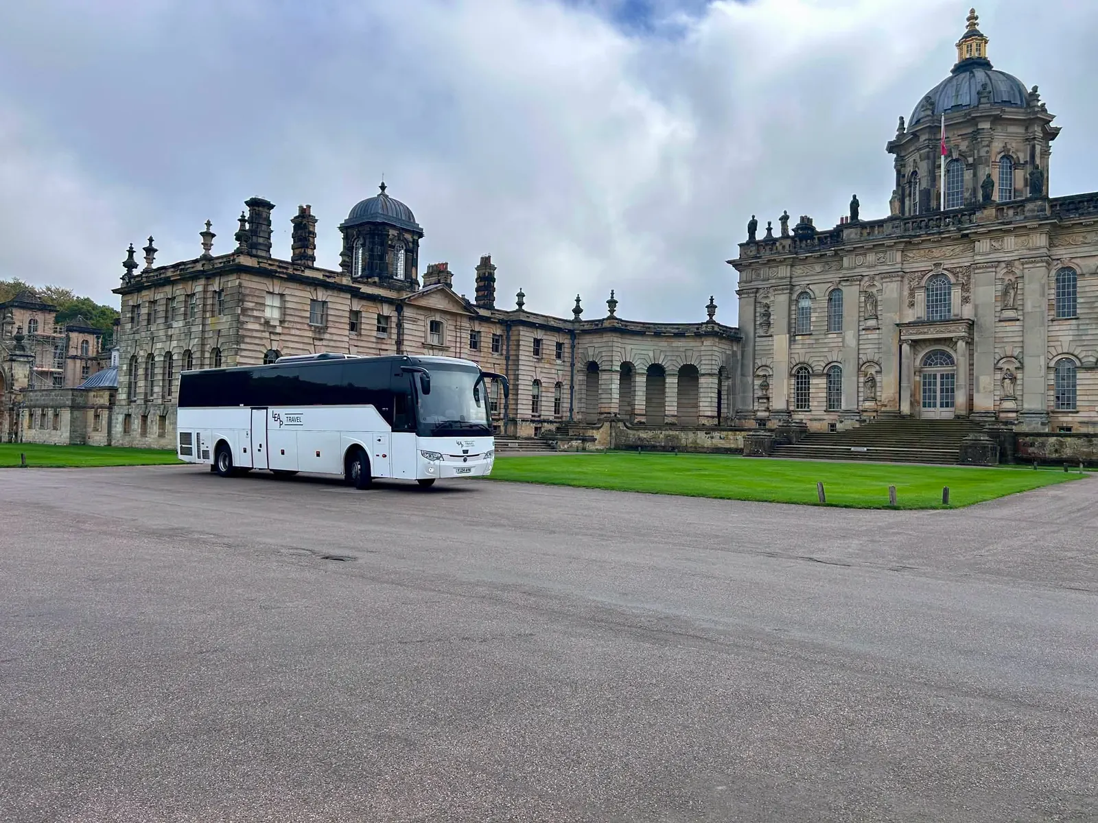 Leap Travel 57-seat coach outside Castle Howard