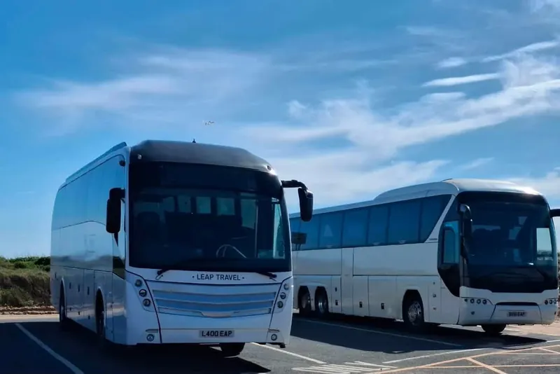 Leap Travel Levante and Tourliner coaches parked side by side