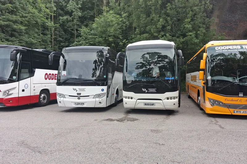 Leap Travel Temsa and Tourliner coaches parked together
