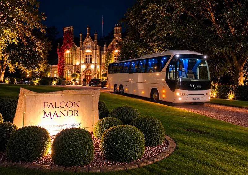Leap Travel wedding coach outside Falcon Manor at night